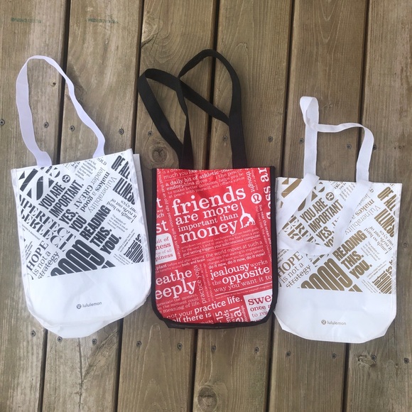 lululemon athletica Handbags - Lululemon Bags small lot of 3 white red gold black